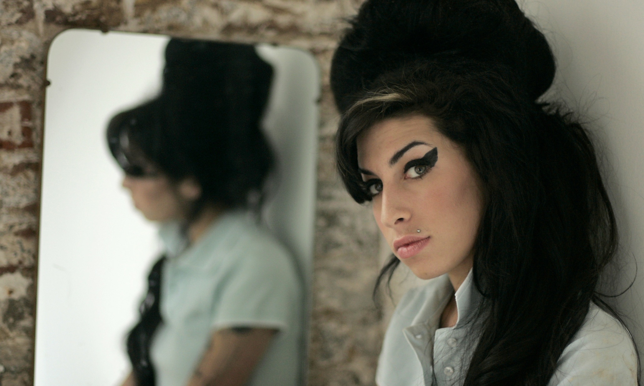 top films of 2015 FILE - In this Feb. 16, 2007 file photo, British singer Amy Winehouse poses for photographs after being interviewed by The Associated Press at a studio in north London. Amy Winehouse, the beehived soul-jazz diva whose self-destructive habits overshadowed a distinctive musical talent, was found dead Saturday in her London home, police said. She was 27. (AP Photo/Matt Dunham, File)