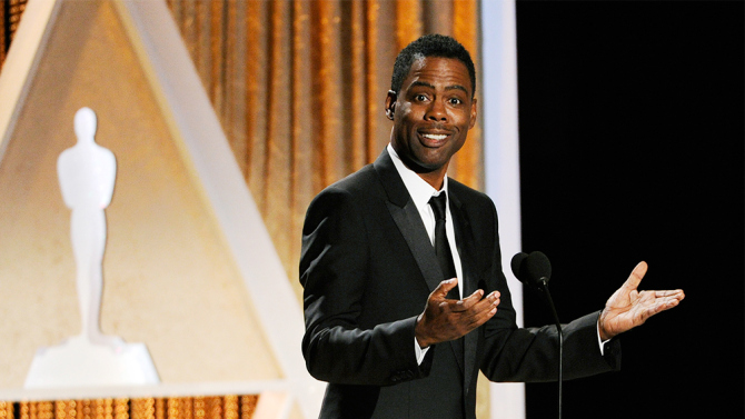 #oscarssowhite Actor/comedian Chris Rock addresses the audience during the 2014 Governors Awards on Saturday, Nov. 8, 2014, in Los Angeles. (Photo by Chris Pizzello/Invision/AP)